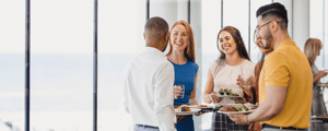 group of event attendees enjoying lunch at a corporate event