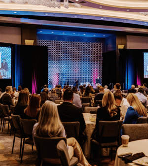 group of attendees watching a corporate conference presentation in San Francisco
