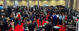 Attendees walking around a supplier expo at a conference event