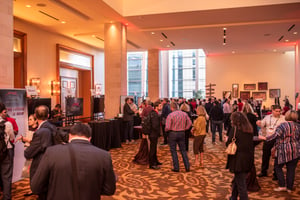 group of attendees walking around a Trade show event