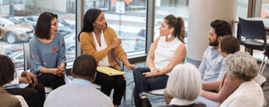 group of attendees networking during a breakout session