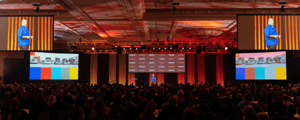 CEO giving presentation at a corporate conference