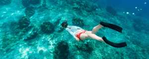 woman snorkeling in ocean as an incentive trip activity
