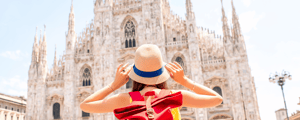 woman wearing a hat while traveling in italy