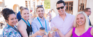 group of event attendees making a toast